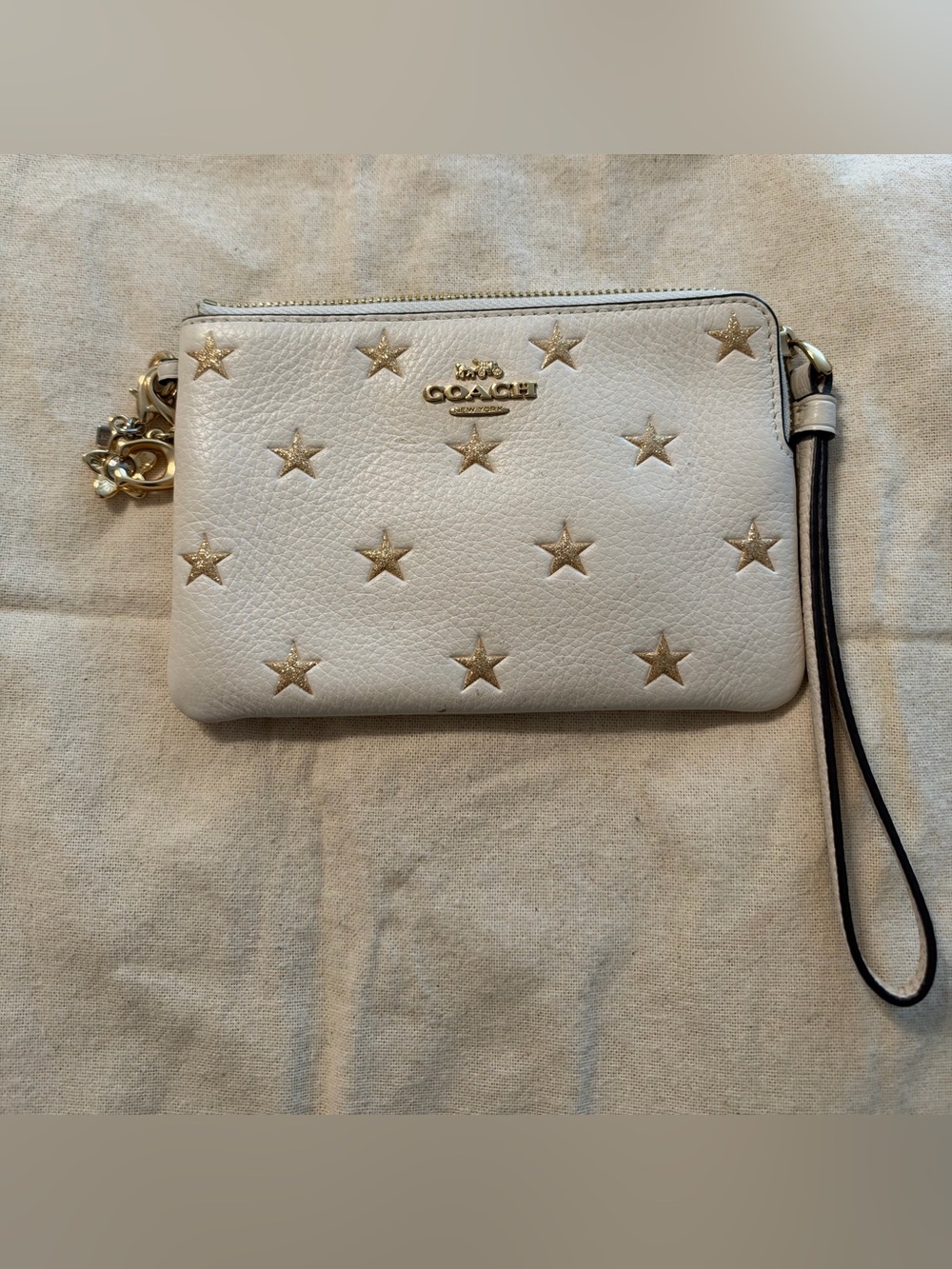 COACH White Pebbled Leather Wristlet Gold Glitter Star Print + Coach Charms